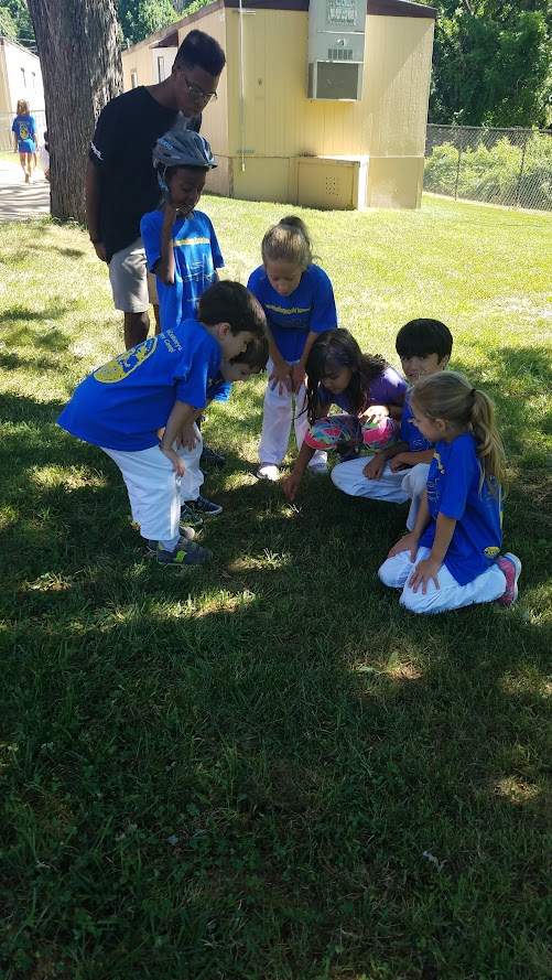 Kids learning on the grass