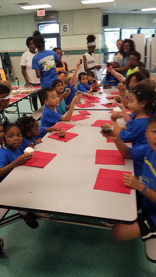 Cupcake celebration in cafeteria