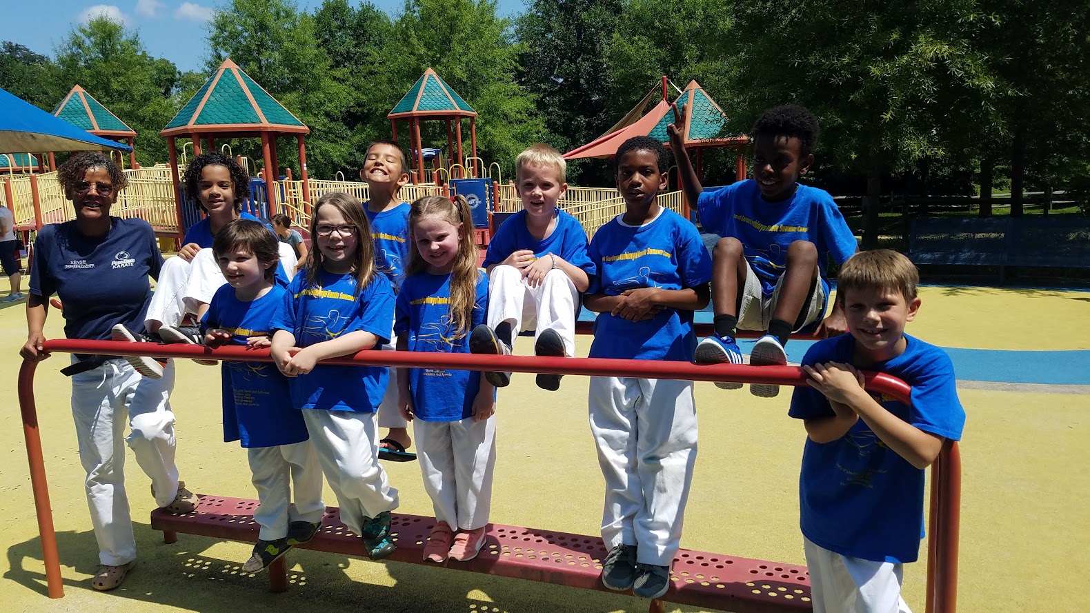 Group at colorful splash pad playground