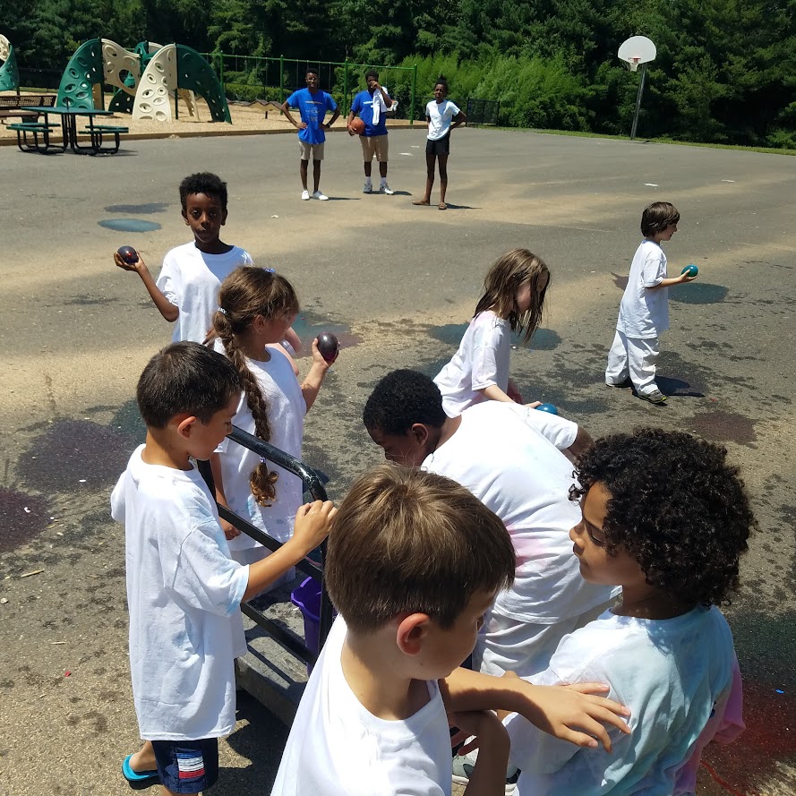 Water balloon activity on court