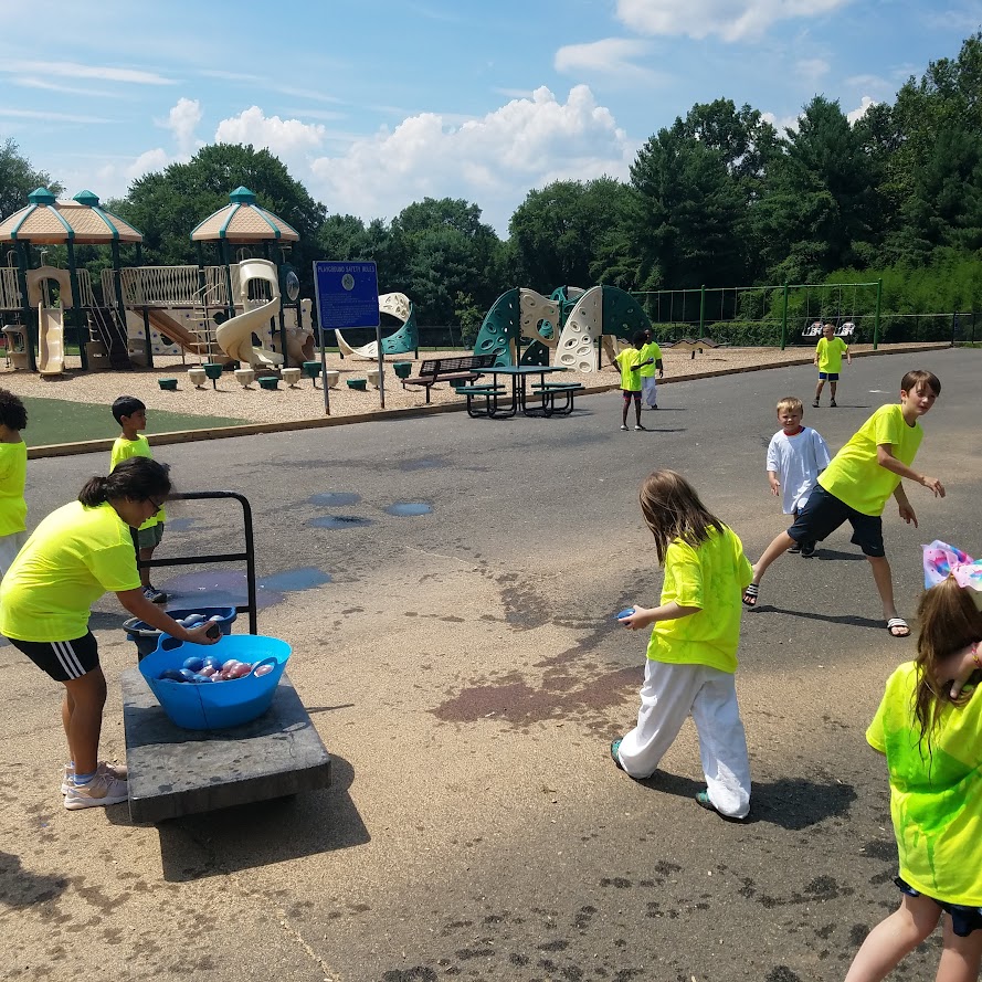 Water balloon activity at playground