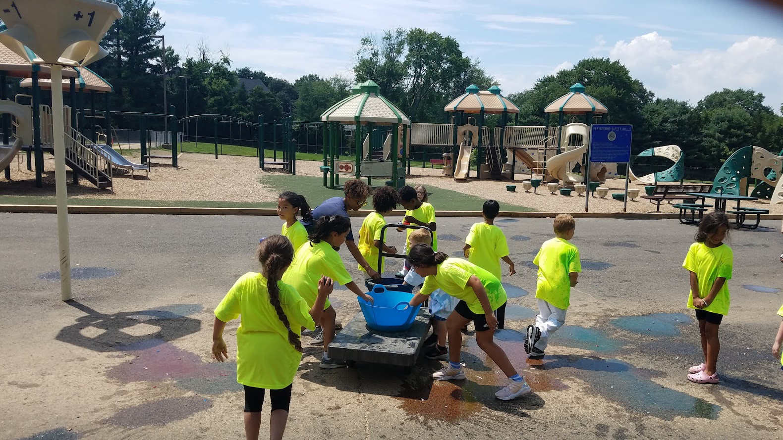 Group water balloon activity at playground