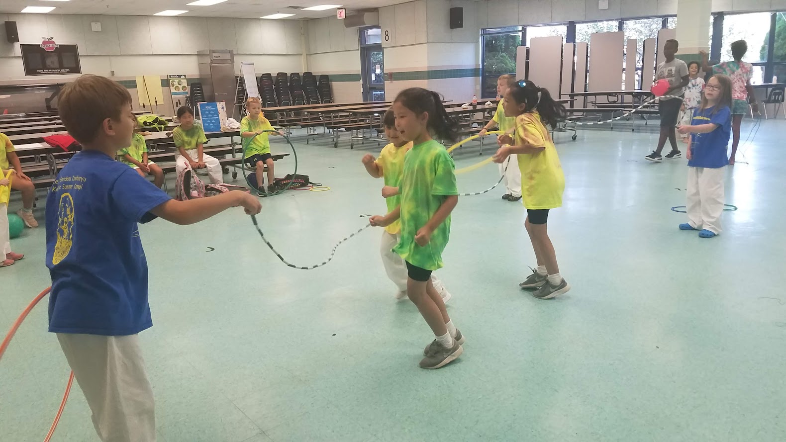 Jump rope activity with tie-dye shirts